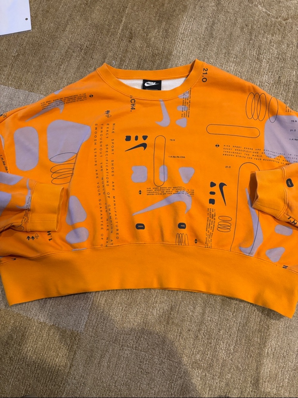 ~ Nike~ Orange Cropped Crewneck with Gray & Black Graphic Details